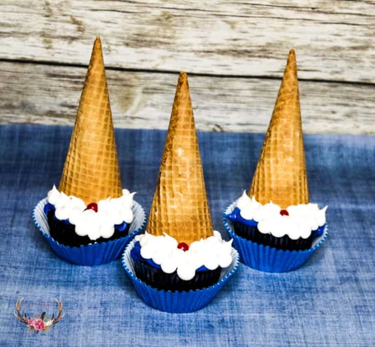 and top each cupcake with a swirl.