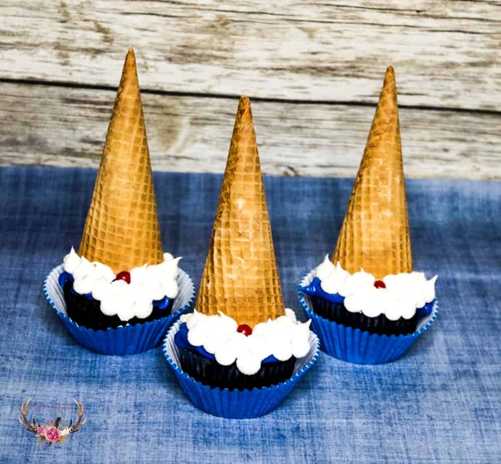 and top each cupcake with a swirl.