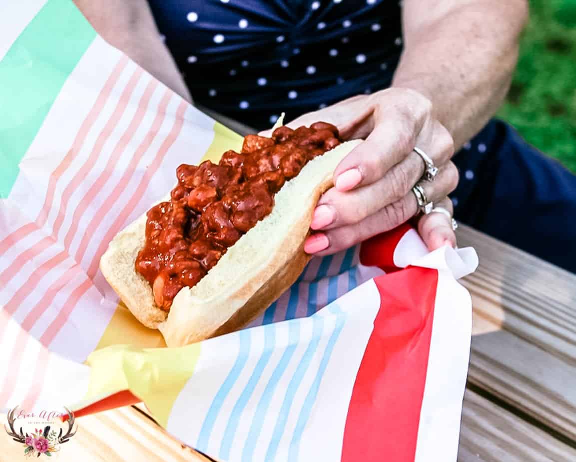 chili dog lady holding