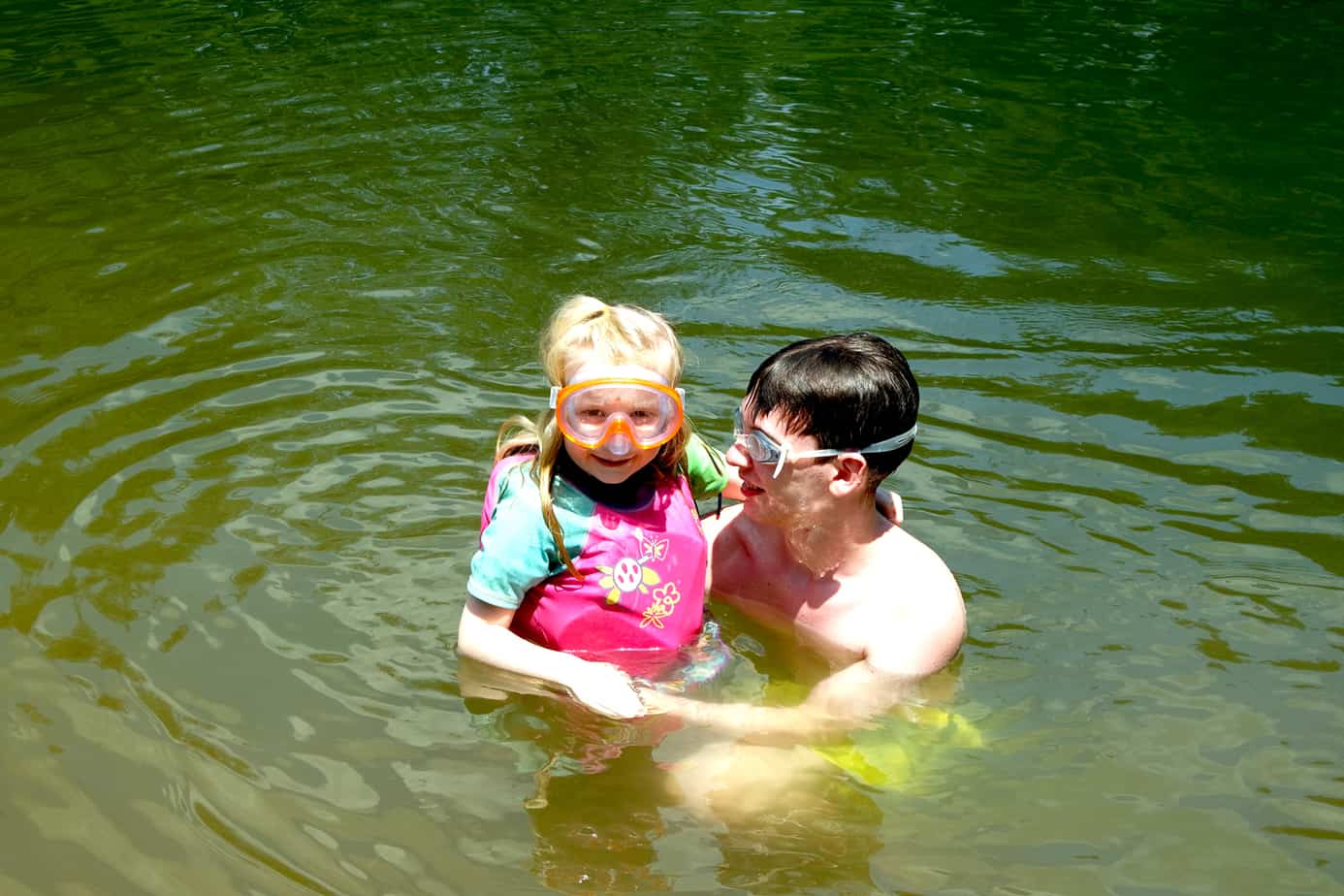 kids playing in pond